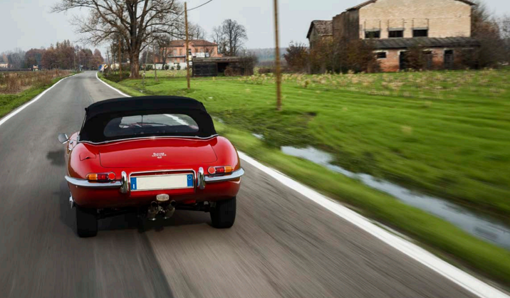 A flaming red Jaguar E-Type 4.2 Spider