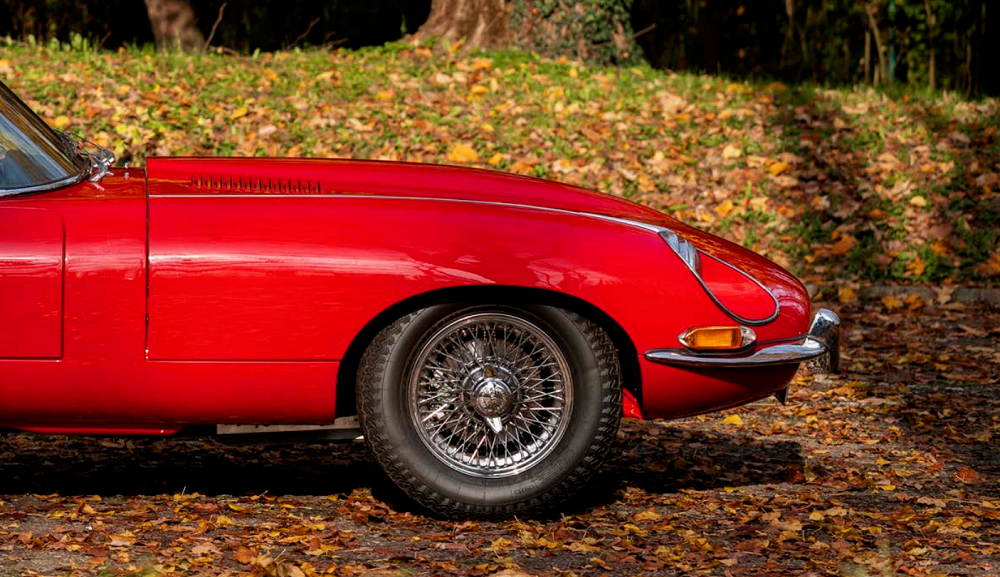 A flaming red Jaguar E-Type 4.2 Spider